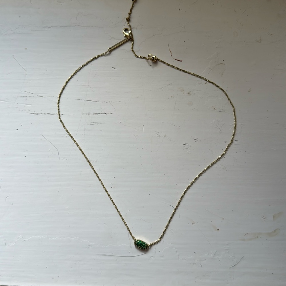 Kendra Scott green gemstone necklace.